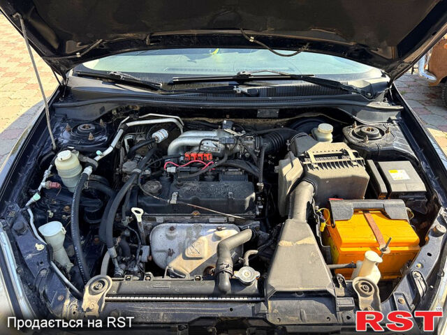 Черный Мицубиси Лансер, объемом двигателя 1.6 л и пробегом 300 тыс. км за 3599 $, фото 12 на Automoto.ua