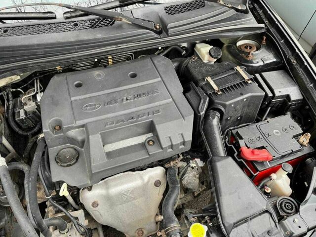 Черный Мицубиси Лансер, объемом двигателя 1.6 л и пробегом 250 тыс. км за 1300 $, фото 9 на Automoto.ua