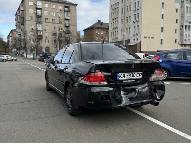 Черный Мицубиси Лансер, объемом двигателя 0 л и пробегом 319 тыс. км за 2700 $, фото 7 на Automoto.ua