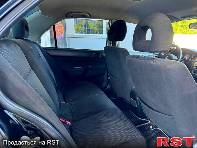 Чорний Міцубісі Lancer, об'ємом двигуна 1.6 л та пробігом 176 тис. км за 3777 $, фото 5 на Automoto.ua