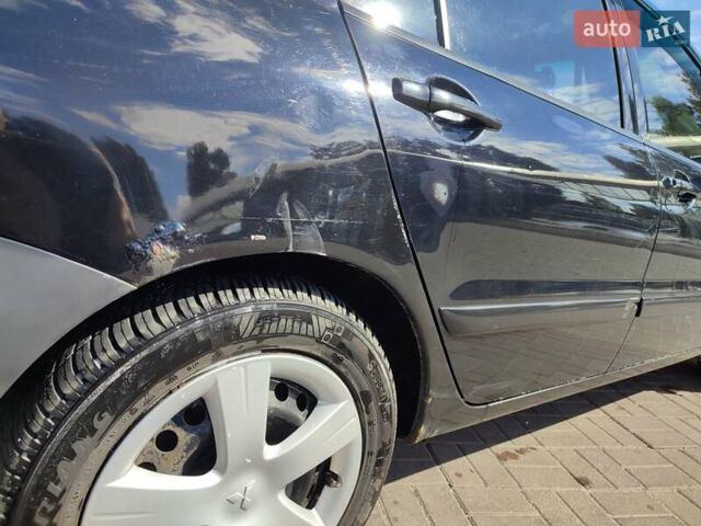 Чорний Міцубісі Lancer, об'ємом двигуна 1.58 л та пробігом 128 тис. км за 4600 $, фото 30 на Automoto.ua