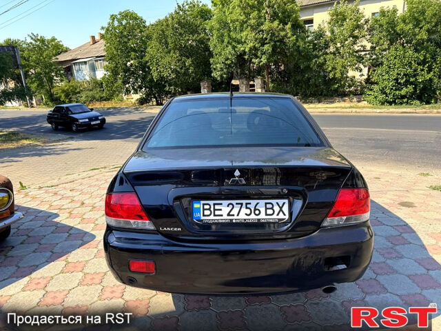 Черный Мицубиси Лансер, объемом двигателя 1.6 л и пробегом 300 тыс. км за 3599 $, фото 8 на Automoto.ua