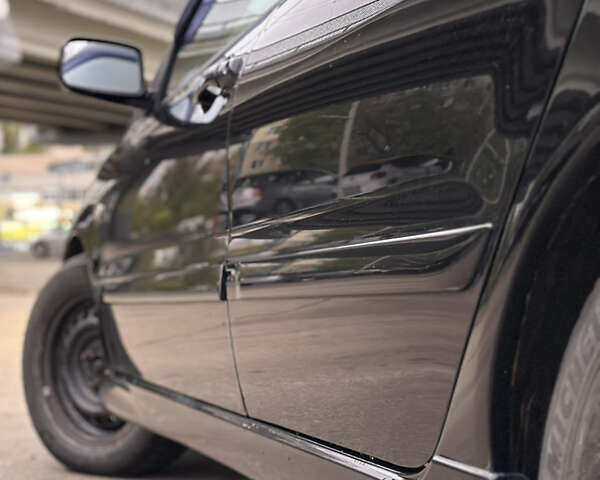 Чорний Міцубісі Lancer, об'ємом двигуна 1.58 л та пробігом 230 тис. км за 4350 $, фото 10 на Automoto.ua