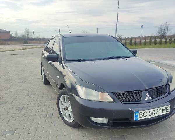 Чорний Міцубісі Lancer, об'ємом двигуна 1.6 л та пробігом 360 тис. км за 3199 $, фото 1 на Automoto.ua