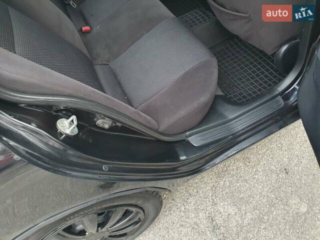 Черный Мицубиси Лансер, объемом двигателя 1.58 л и пробегом 222 тыс. км за 2999 $, фото 7 на Automoto.ua