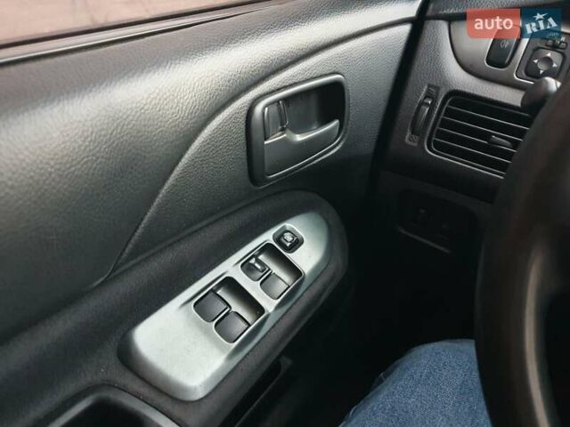 Чорний Міцубісі Lancer, об'ємом двигуна 1.58 л та пробігом 222 тис. км за 2999 $, фото 26 на Automoto.ua