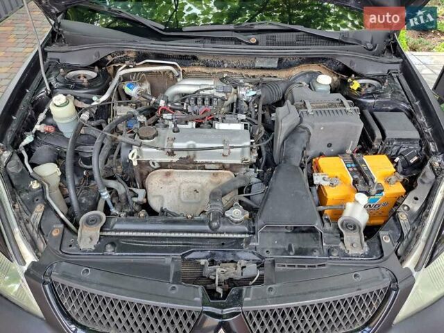 Чорний Міцубісі Lancer, об'ємом двигуна 1.58 л та пробігом 280 тис. км за 3950 $, фото 23 на Automoto.ua