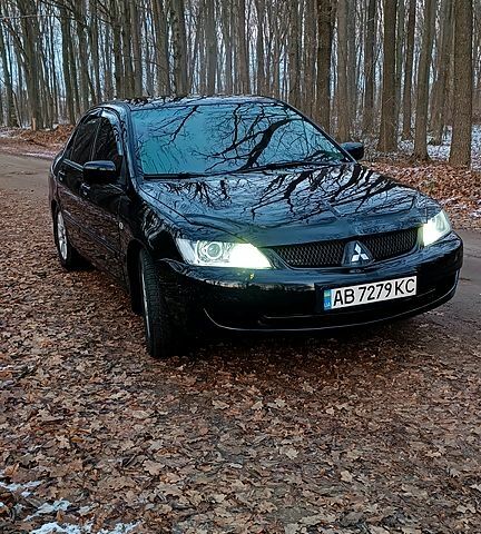 Чорний Міцубісі Lancer, об'ємом двигуна 1.6 л та пробігом 345 тис. км за 3700 $, фото 1 на Automoto.ua