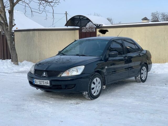 Чорний Міцубісі Lancer, об'ємом двигуна 1.6 л та пробігом 237 тис. км за 3850 $, фото 2 на Automoto.ua