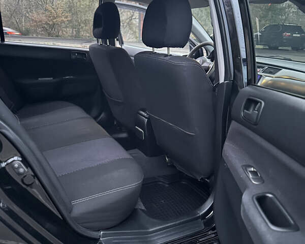 Чорний Міцубісі Lancer, об'ємом двигуна 1.58 л та пробігом 230 тис. км за 4350 $, фото 18 на Automoto.ua