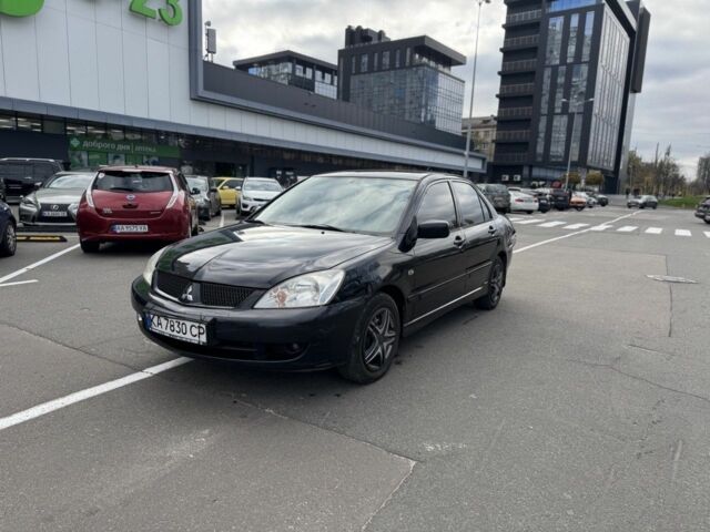 Черный Мицубиси Лансер, объемом двигателя 0 л и пробегом 319 тыс. км за 2700 $, фото 2 на Automoto.ua