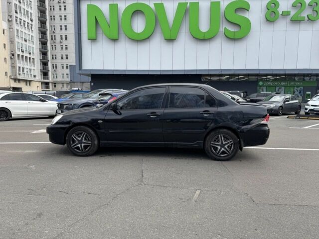 Черный Мицубиси Лансер, объемом двигателя 0 л и пробегом 319 тыс. км за 2700 $, фото 6 на Automoto.ua