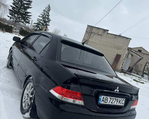 Чорний Міцубісі Lancer, об'ємом двигуна 1.58 л та пробігом 340 тис. км за 3550 $, фото 7 на Automoto.ua