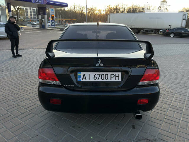 Чорний Міцубісі Lancer, об'ємом двигуна 1.58 л та пробігом 256 тис. км за 5350 $, фото 3 на Automoto.ua