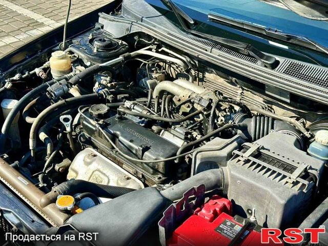 Черный Мицубиси Лансер, объемом двигателя 1.6 л и пробегом 208 тыс. км за 4999 $, фото 3 на Automoto.ua