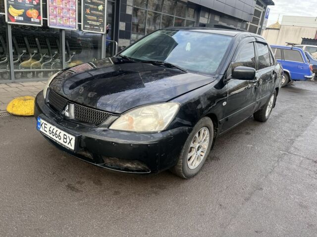 Черный Мицубиси Лансер, объемом двигателя 1.6 л и пробегом 299 тыс. км за 3480 $, фото 3 на Automoto.ua