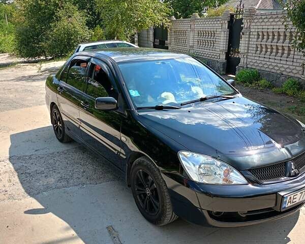 Чорний Міцубісі Lancer, об'ємом двигуна 1.6 л та пробігом 240 тис. км за 5400 $, фото 1 на Automoto.ua