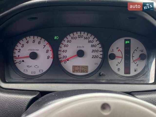 Чорний Міцубісі Lancer, об'ємом двигуна 2 л та пробігом 248 тис. км за 4990 $, фото 14 на Automoto.ua