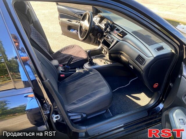 Чорний Міцубісі Lancer, об'ємом двигуна 1.6 л та пробігом 244 тис. км за 4100 $, фото 8 на Automoto.ua