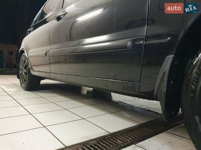 Чорний Міцубісі Lancer, об'ємом двигуна 1.58 л та пробігом 222 тис. км за 2999 $, фото 10 на Automoto.ua