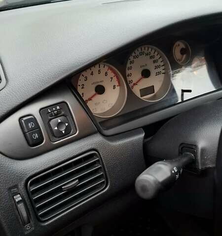 Черный Мицубиси Лансер, объемом двигателя 1.58 л и пробегом 246 тыс. км за 4200 $, фото 10 на Automoto.ua