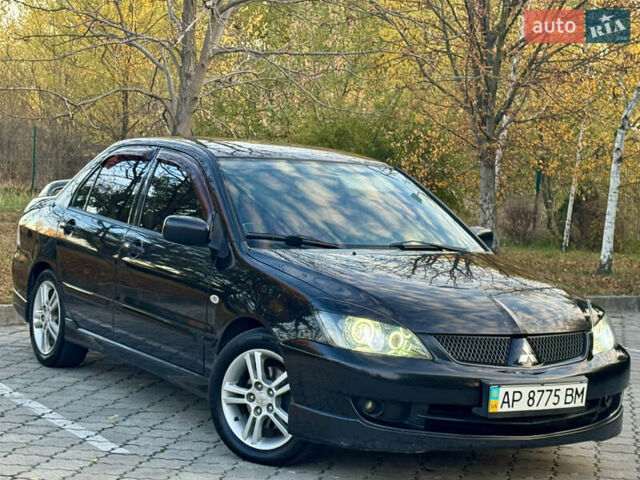 Міцубісі Lancer 2006 у Дніпро (Дніпропетровську) на Automoto.ua Чорний Міцубісі Lancer, об'ємом двигуна 2 л та пробігом 230 тис. км за 4900 $, фото 5 на Automoto.ua