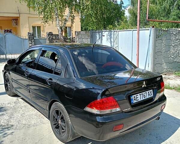 Чорний Міцубісі Lancer, об'ємом двигуна 1.6 л та пробігом 240 тис. км за 5400 $, фото 3 на Automoto.ua