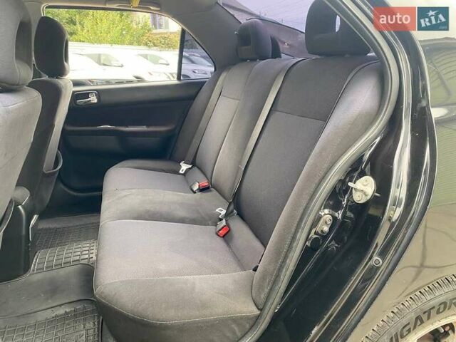 Чорний Міцубісі Lancer, об'ємом двигуна 2 л та пробігом 248 тис. км за 4990 $, фото 9 на Automoto.ua