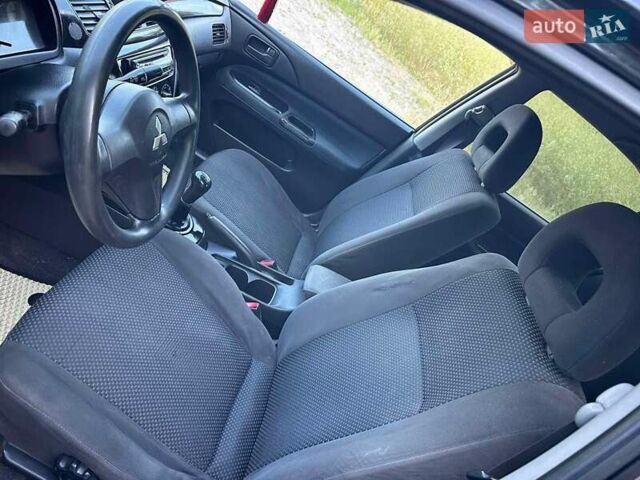 Мицубиси Лансер 2006 в Киеве на Automoto.ua Черный Мицубиси Лансер, объемом двигателя 1.58 л и пробегом 268 тыс. км за 3400 $, фото 2 на Automoto.ua