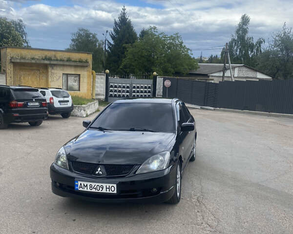 Чорний Міцубісі Lancer, об'ємом двигуна 2 л та пробігом 183 тис. км за 4500 $, фото 29 на Automoto.ua