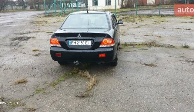 Чорний Міцубісі Lancer, об'ємом двигуна 1.6 л та пробігом 230 тис. км за 3250 $, фото 2 на Automoto.ua