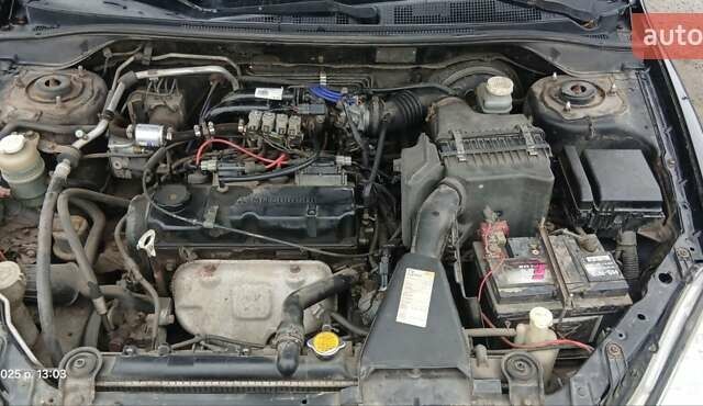 Чорний Міцубісі Lancer, об'ємом двигуна 1.6 л та пробігом 230 тис. км за 3250 $, фото 6 на Automoto.ua