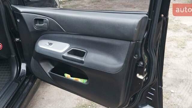 Чорний Міцубісі Lancer, об'ємом двигуна 1.59 л та пробігом 185 тис. км за 4900 $, фото 4 на Automoto.ua