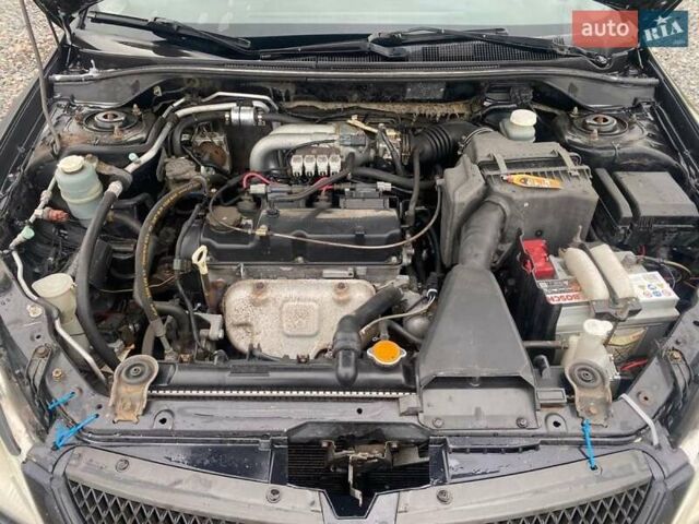 Чорний Міцубісі Lancer, об'ємом двигуна 1.6 л та пробігом 335 тис. км за 3500 $, фото 9 на Automoto.ua