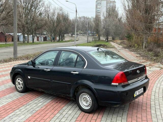 Черный Мицубиси Лансер, объемом двигателя 1.6 л и пробегом 250 тыс. км за 1300 $, фото 5 на Automoto.ua