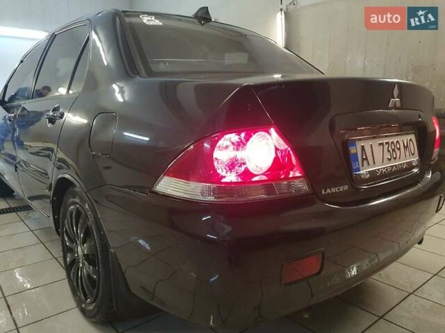 Чорний Міцубісі Lancer, об'ємом двигуна 1.58 л та пробігом 222 тис. км за 2999 $, фото 8 на Automoto.ua