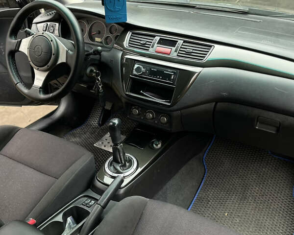 Чорний Міцубісі Lancer, об'ємом двигуна 2 л та пробігом 242 тис. км за 5900 $, фото 16 на Automoto.ua