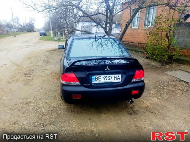 Чорний Міцубісі Lancer, об'ємом двигуна 1.6 л та пробігом 226 тис. км за 4800 $, фото 1 на Automoto.ua