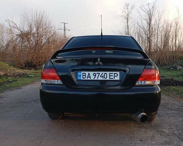 Чорний Міцубісі Lancer, об'ємом двигуна 1.6 л та пробігом 325 тис. км за 4750 $, фото 19 на Automoto.ua