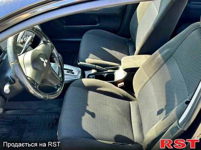 Черный Мицубиси Лансер, объемом двигателя 1.6 л и пробегом 208 тыс. км за 4999 $, фото 4 на Automoto.ua