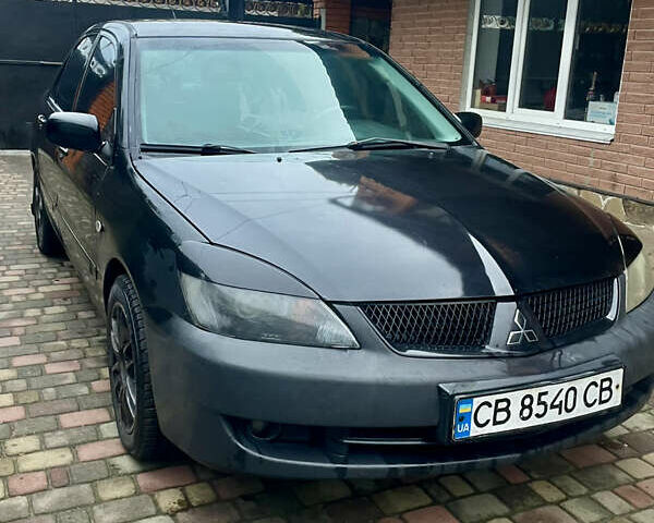 Чорний Міцубісі Lancer, об'ємом двигуна 1.59 л та пробігом 305 тис. км за 2950 $, фото 9 на Automoto.ua