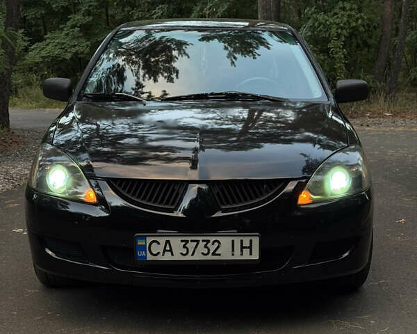 Чорний Міцубісі Lancer, об'ємом двигуна 1.6 л та пробігом 375 тис. км за 4500 $, фото 3 на Automoto.ua