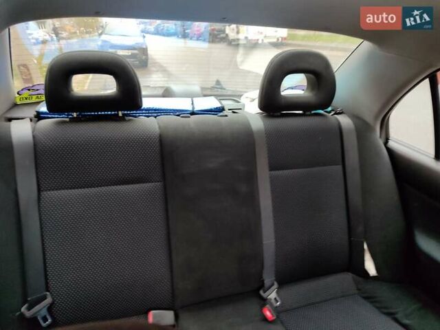 Черный Мицубиси Лансер, объемом двигателя 1.58 л и пробегом 270 тыс. км за 4000 $, фото 11 на Automoto.ua