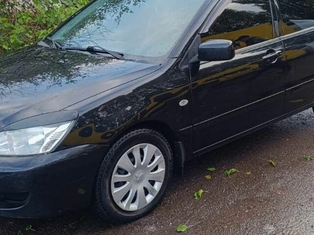 Чорний Міцубісі Lancer, об'ємом двигуна 1.6 л та пробігом 250 тис. км за 4000 $, фото 2 на Automoto.ua