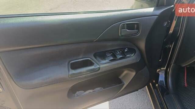 Чорний Міцубісі Lancer, об'ємом двигуна 1.6 л та пробігом 240 тис. км за 3900 $, фото 7 на Automoto.ua