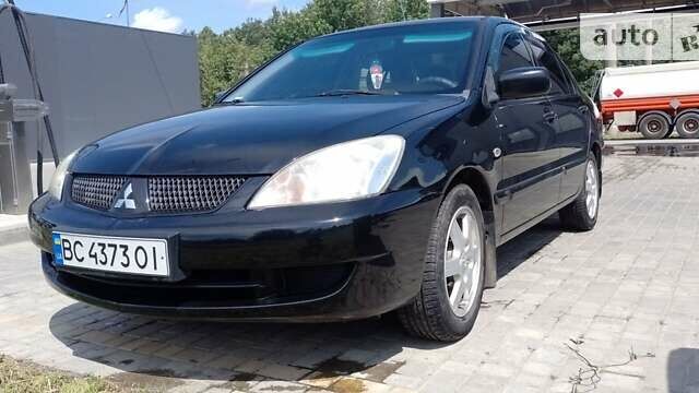 Чорний Міцубісі Lancer, об'ємом двигуна 1.6 л та пробігом 200 тис. км за 4500 $, фото 2 на Automoto.ua