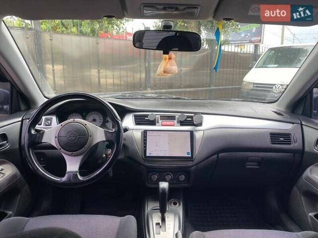 Чорний Міцубісі Lancer, об'ємом двигуна 2 л та пробігом 248 тис. км за 4990 $, фото 12 на Automoto.ua