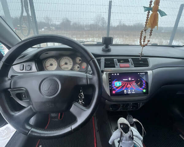 Чорний Міцубісі Lancer, об'ємом двигуна 1.6 л та пробігом 280 тис. км за 3700 $, фото 8 на Automoto.ua