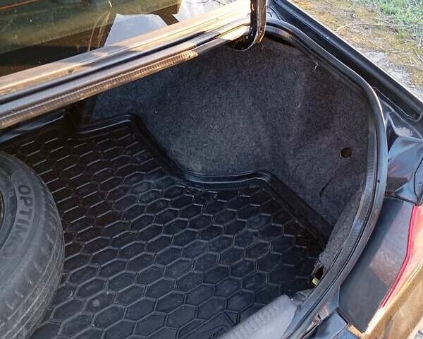 Чорний Міцубісі Lancer, об'ємом двигуна 1.6 л та пробігом 325 тис. км за 4750 $, фото 6 на Automoto.ua