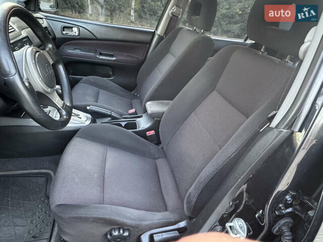 Міцубісі Lancer 2006 у Дніпро (Дніпропетровську) на Automoto.ua Чорний Міцубісі Lancer, об'ємом двигуна 2 л та пробігом 230 тис. км за 4900 $, фото 15 на Automoto.ua